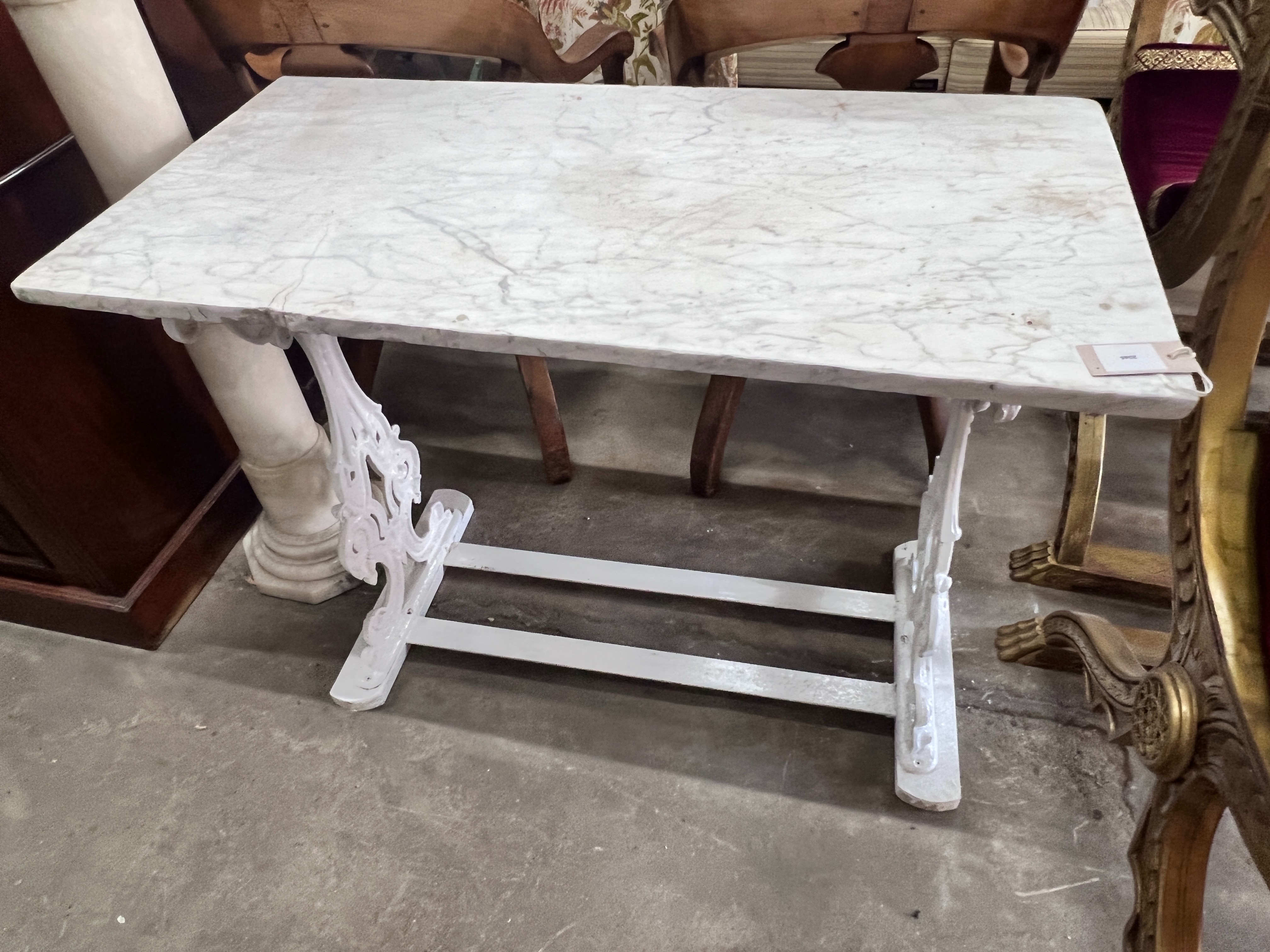 A Victorian painted cast iron garden table with rectangular marble top, length 97cm, depth 50cm, height 74cm